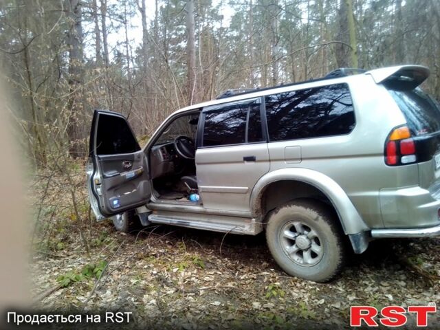 Сірий Міцубісі Паджеро Спорт, об'ємом двигуна 3 л та пробігом 327 тис. км за 7400 $, фото 4 на Automoto.ua