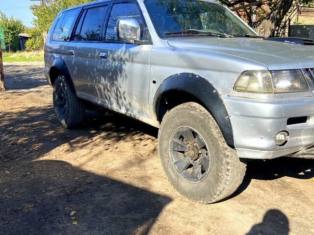 Мицубиси Паджеро Спорт 1999 в Николаеве на Automoto.ua Серый Мицубиси Паджеро Спорт, объемом двигателя 2.5 л и пробегом 325 тыс. км за 5500 $, фото 6 на Automoto.ua