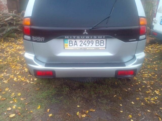 Серый Мицубиси Паджеро Спорт, объемом двигателя 3 л и пробегом 280 тыс. км за 3788 $, фото 2 на Automoto.ua