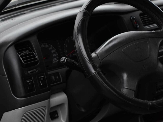 Сірий Міцубісі Паджеро Спорт, об'ємом двигуна 3 л та пробігом 240 тис. км за 6450 $, фото 7 на Automoto.ua