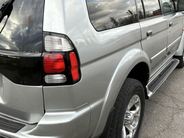 Серый Мицубиси Паджеро Спорт, объемом двигателя 3 л и пробегом 240 тыс. км за 6499 $, фото 3 на Automoto.ua