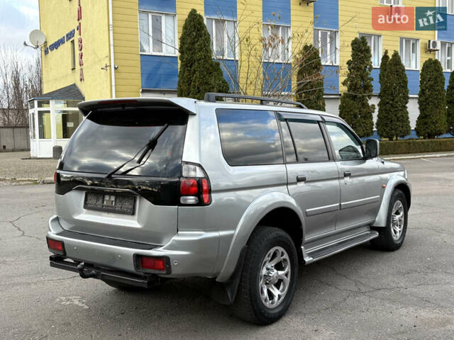 Серый Мицубиси Паджеро Спорт, объемом двигателя 3 л и пробегом 240 тыс. км за 6499 $, фото 2 на Automoto.ua