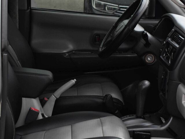 Сірий Міцубісі Паджеро Спорт, об'ємом двигуна 3 л та пробігом 240 тис. км за 6450 $, фото 12 на Automoto.ua