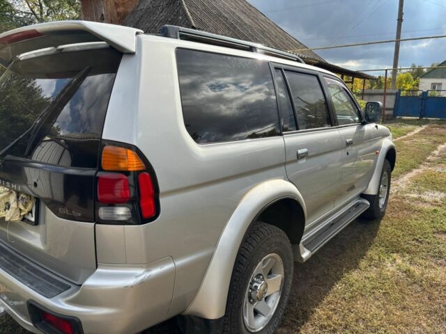 Сірий Міцубісі Паджеро Спорт, об'ємом двигуна 3 л та пробігом 149 тис. км за 6800 $, фото 4 на Automoto.ua