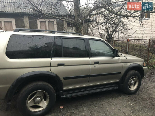 Сірий Міцубісі Паджеро Спорт, об'ємом двигуна 3 л та пробігом 300 тис. км за 6500 $, фото 1 на Automoto.ua