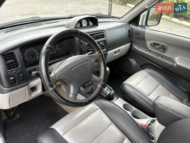 Серый Мицубиси Паджеро Спорт, объемом двигателя 3 л и пробегом 240 тыс. км за 6499 $, фото 13 на Automoto.ua