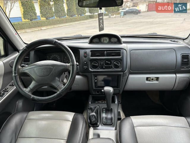 Серый Мицубиси Паджеро Спорт, объемом двигателя 3 л и пробегом 240 тыс. км за 6499 $, фото 16 на Automoto.ua