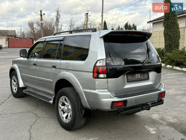 Серый Мицубиси Паджеро Спорт, объемом двигателя 3 л и пробегом 240 тыс. км за 6499 $, фото 5 на Automoto.ua