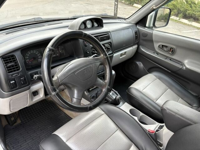 Серый Мицубиси Паджеро Спорт, объемом двигателя 3 л и пробегом 240 тыс. км за 6499 $, фото 13 на Automoto.ua