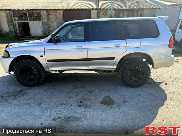 Сірий Міцубісі Паджеро Спорт, об'ємом двигуна 2.5 л та пробігом 267 тис. км за 3500 $, фото 1 на Automoto.ua