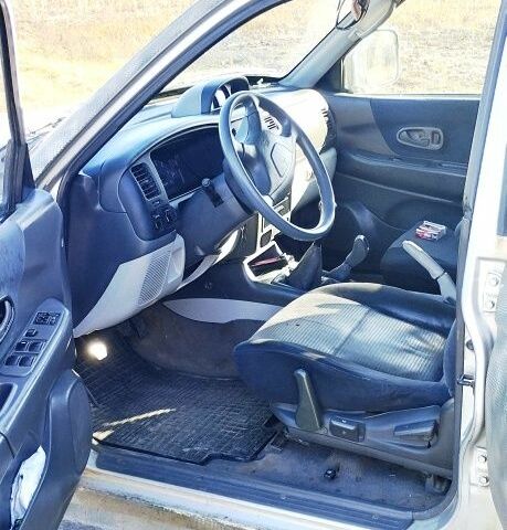 Сірий Міцубісі Паджеро Спорт, об'ємом двигуна 2.5 л та пробігом 396 тис. км за 4900 $, фото 7 на Automoto.ua