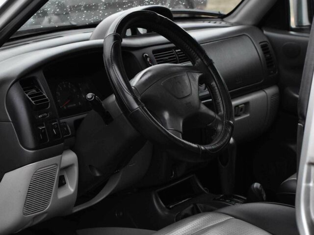 Сірий Міцубісі Паджеро Спорт, об'ємом двигуна 3 л та пробігом 240 тис. км за 6450 $, фото 8 на Automoto.ua