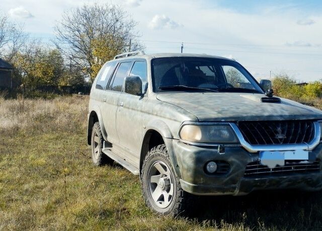 Сірий Міцубісі Паджеро Спорт, об'ємом двигуна 2.5 л та пробігом 396 тис. км за 4900 $, фото 1 на Automoto.ua