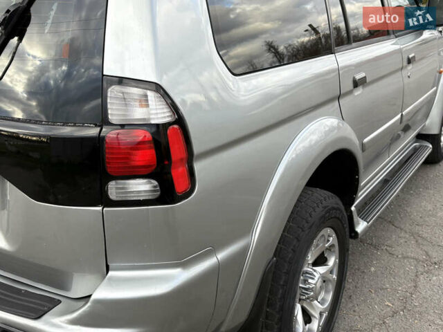 Серый Мицубиси Паджеро Спорт, объемом двигателя 3 л и пробегом 240 тыс. км за 6499 $, фото 3 на Automoto.ua