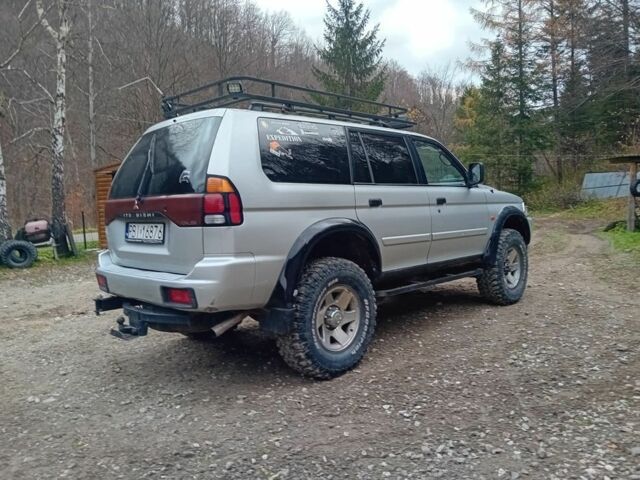 Сірий Міцубісі Паджеро Спорт, об'ємом двигуна 3 л та пробігом 376 тис. км за 2100 $, фото 3 на Automoto.ua