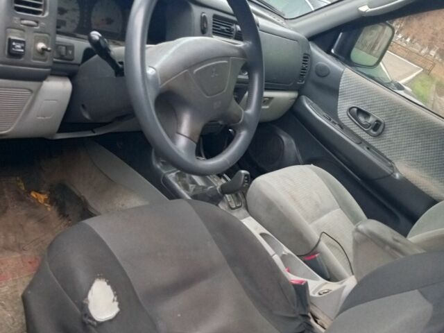 Серый Мицубиси Паджеро Спорт, объемом двигателя 3.5 л и пробегом 200 тыс. км за 5000 $, фото 9 на Automoto.ua