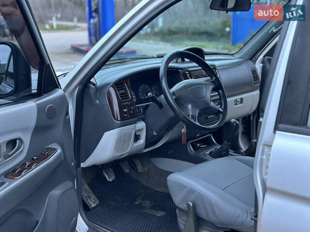 Сірий Міцубісі Паджеро Спорт, об'ємом двигуна 3 л та пробігом 250 тис. км за 5999 $, фото 8 на Automoto.ua