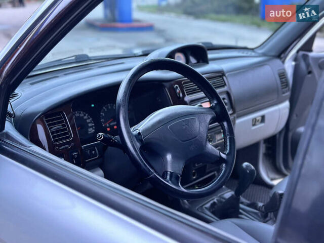 Сірий Міцубісі Паджеро Спорт, об'ємом двигуна 3 л та пробігом 250 тис. км за 5999 $, фото 14 на Automoto.ua