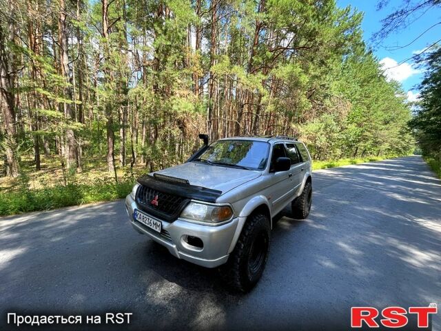 Серый Мицубиси Паджеро Спорт, объемом двигателя 3 л и пробегом 242 тыс. км за 6999 $, фото 4 на Automoto.ua