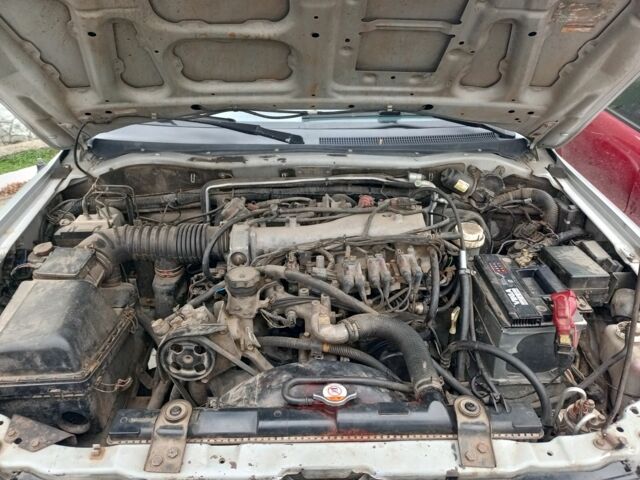 Серый Мицубиси Паджеро Спорт, объемом двигателя 3.5 л и пробегом 200 тыс. км за 5000 $, фото 1 на Automoto.ua