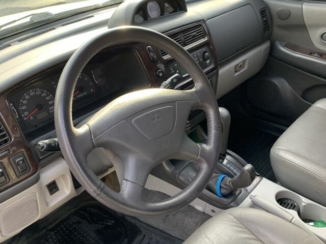 Сірий Міцубісі Паджеро Спорт, об'ємом двигуна 3 л та пробігом 268 тис. км за 7000 $, фото 4 на Automoto.ua