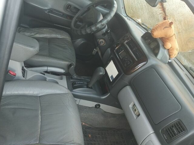 Серый Мицубиси Паджеро Спорт, объемом двигателя 3 л и пробегом 380 тыс. км за 6000 $, фото 1 на Automoto.ua