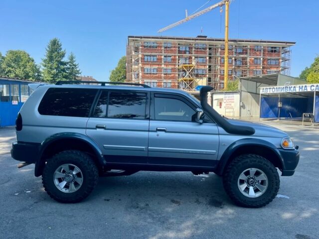 Сірий Міцубісі Паджеро Спорт, об'ємом двигуна 3 л та пробігом 253 тис. км за 2850 $, фото 2 на Automoto.ua