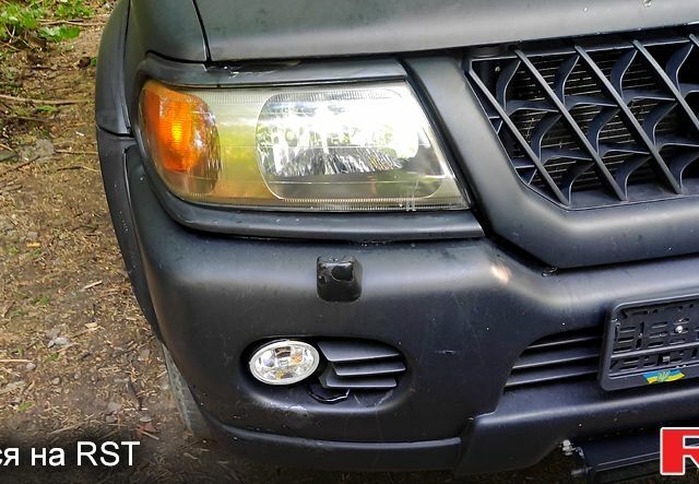 Сірий Міцубісі Паджеро Спорт, об'ємом двигуна 3 л та пробігом 240 тис. км за 8000 $, фото 2 на Automoto.ua