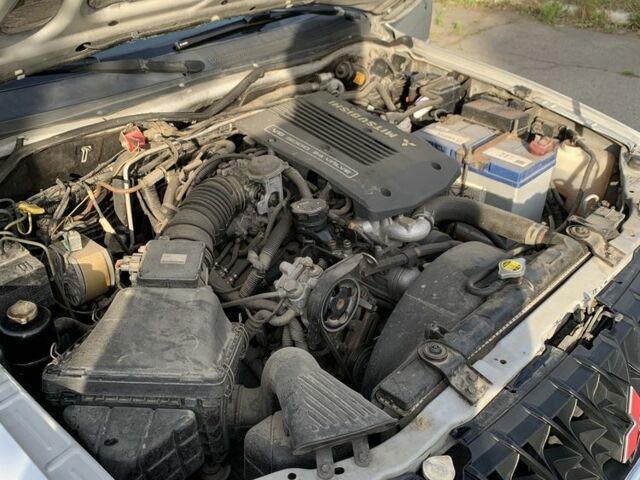 Сірий Міцубісі Паджеро Спорт, об'ємом двигуна 3 л та пробігом 268 тис. км за 7000 $, фото 7 на Automoto.ua