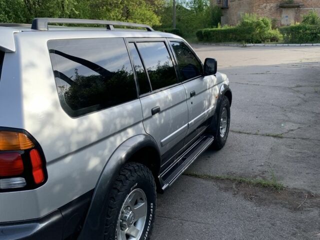 Сірий Міцубісі Паджеро Спорт, об'ємом двигуна 3 л та пробігом 268 тис. км за 7000 $, фото 1 на Automoto.ua