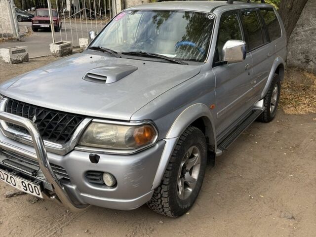 Серый Мицубиси Паджеро Спорт, объемом двигателя 2.5 л и пробегом 283 тыс. км за 7000 $, фото 1 на Automoto.ua