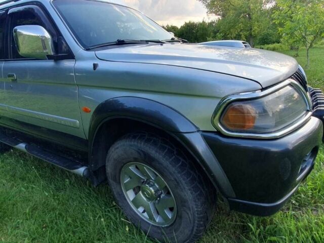 Серый Мицубиси Паджеро Спорт, объемом двигателя 2.5 л и пробегом 235 тыс. км за 8800 $, фото 7 на Automoto.ua