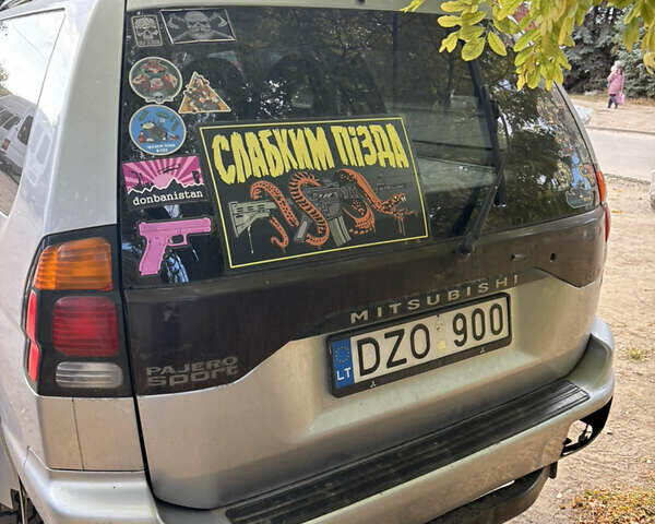 Серый Мицубиси Паджеро Спорт, объемом двигателя 2.5 л и пробегом 283 тыс. км за 6000 $, фото 3 на Automoto.ua