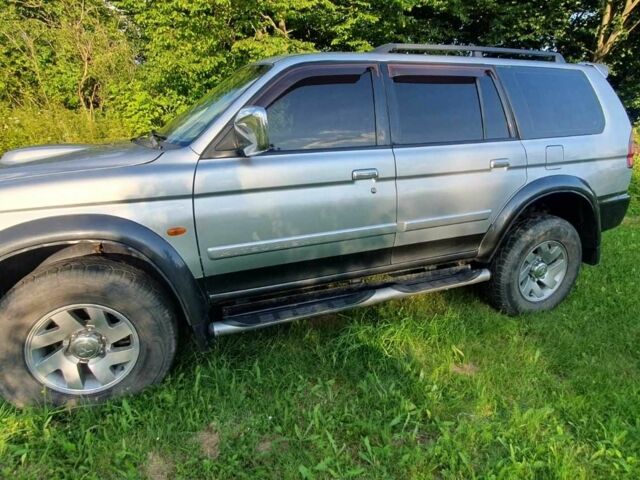 Серый Мицубиси Паджеро Спорт, объемом двигателя 2.5 л и пробегом 235 тыс. км за 8800 $, фото 4 на Automoto.ua