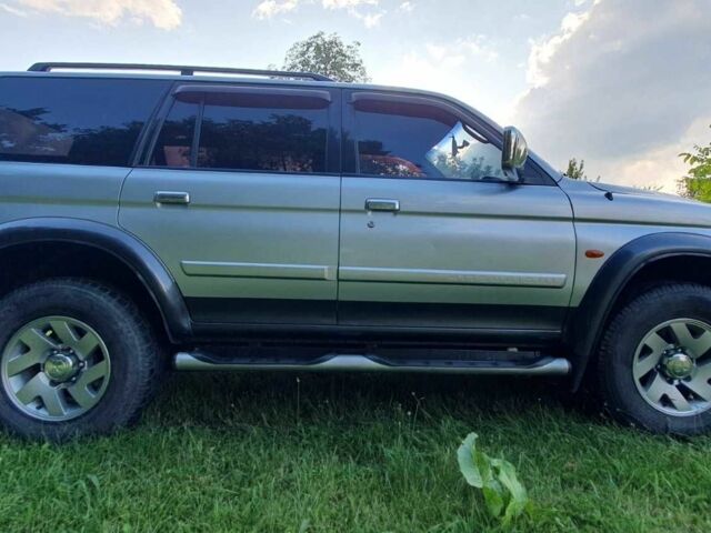 Серый Мицубиси Паджеро Спорт, объемом двигателя 2.5 л и пробегом 235 тыс. км за 8800 $, фото 6 на Automoto.ua