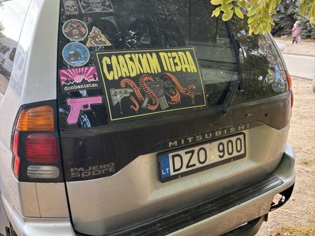 Серый Мицубиси Паджеро Спорт, объемом двигателя 2.5 л и пробегом 283 тыс. км за 7000 $, фото 3 на Automoto.ua