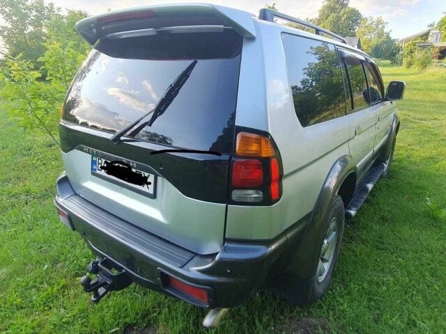 Серый Мицубиси Паджеро Спорт, объемом двигателя 2.5 л и пробегом 235 тыс. км за 8800 $, фото 2 на Automoto.ua