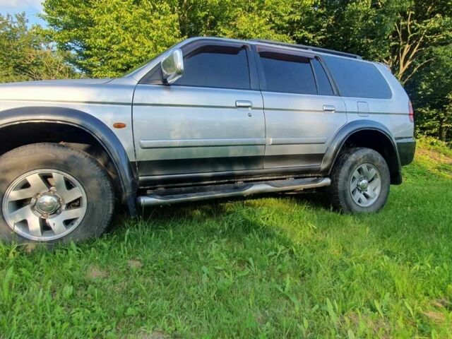 Серый Мицубиси Паджеро Спорт, объемом двигателя 2.5 л и пробегом 235 тыс. км за 8800 $, фото 3 на Automoto.ua