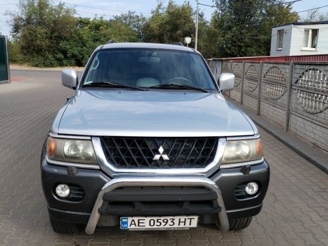 Серый Мицубиси Паджеро Спорт, объемом двигателя 3 л и пробегом 215 тыс. км за 8000 $, фото 1 на Automoto.ua