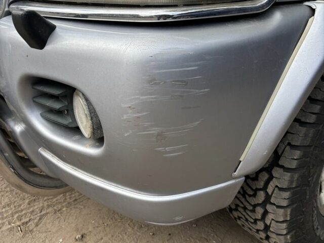 Серый Мицубиси Паджеро Спорт, объемом двигателя 2.5 л и пробегом 283 тыс. км за 7000 $, фото 2 на Automoto.ua