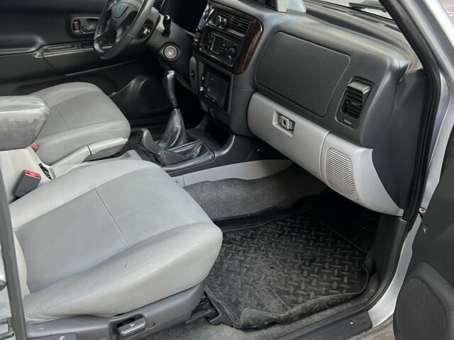 Серый Мицубиси Паджеро Спорт, объемом двигателя 3 л и пробегом 283 тыс. км за 6700 $, фото 1 на Automoto.ua