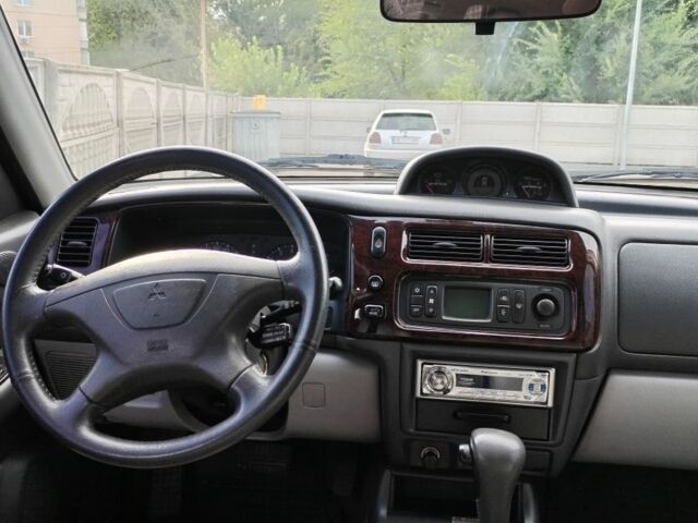 Серый Мицубиси Паджеро Спорт, объемом двигателя 3 л и пробегом 215 тыс. км за 8000 $, фото 5 на Automoto.ua