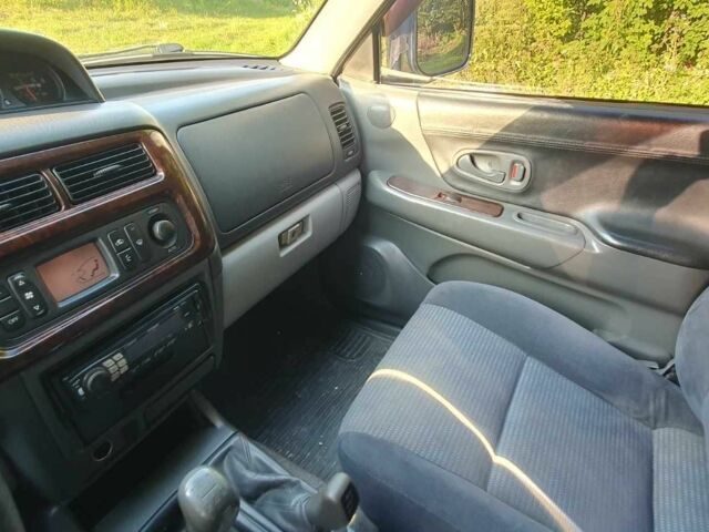 Серый Мицубиси Паджеро Спорт, объемом двигателя 2.5 л и пробегом 235 тыс. км за 8800 $, фото 8 на Automoto.ua