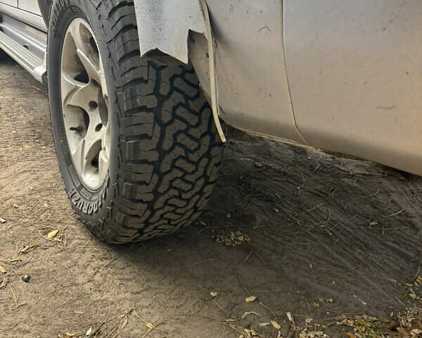 Серый Мицубиси Паджеро Спорт, объемом двигателя 2.5 л и пробегом 283 тыс. км за 5000 $, фото 4 на Automoto.ua