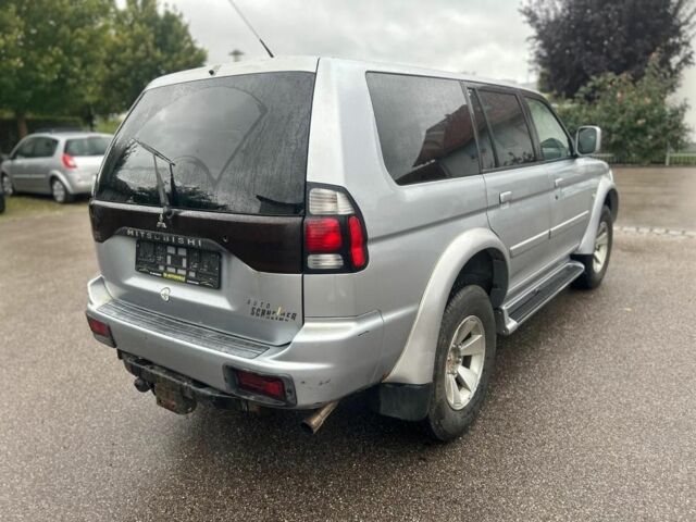 Сірий Міцубісі Паджеро Спорт, об'ємом двигуна 2.5 л та пробігом 276 тис. км за 2900 $, фото 3 на Automoto.ua