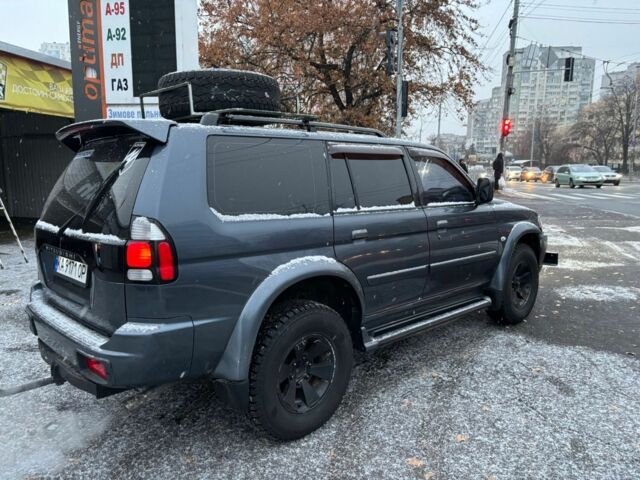Серый Мицубиси Паджеро Спорт, объемом двигателя 3 л и пробегом 300 тыс. км за 5900 $, фото 4 на Automoto.ua