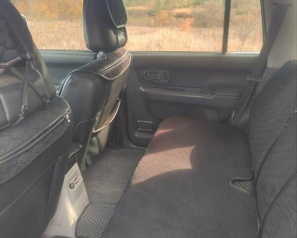 Міцубісі Паджеро Спорт 2005 у Чутове на Automoto.ua Сірий Міцубісі Паджеро Спорт, об'ємом двигуна 3 л та пробігом 299 тис. км за 9000 $, фото 18 на Automoto.ua