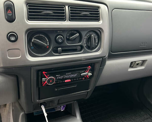 Серый Мицубиси Паджеро Спорт, объемом двигателя 2.5 л и пробегом 250 тыс. км за 8999 $, фото 9 на Automoto.ua