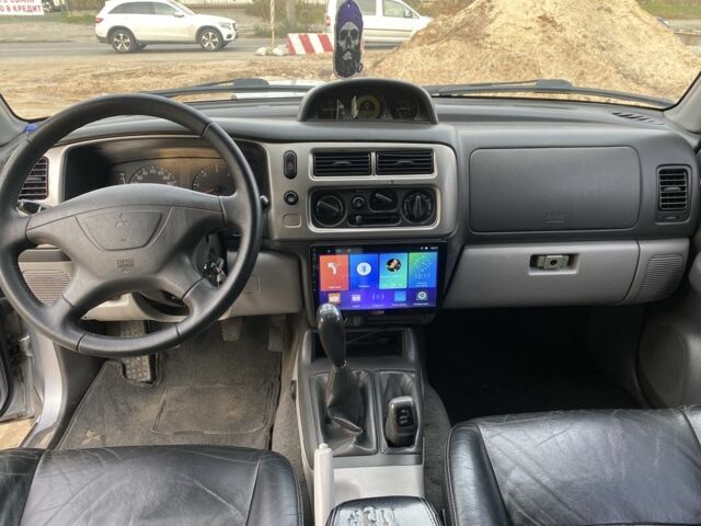 Сірий Міцубісі Паджеро Спорт, об'ємом двигуна 2.5 л та пробігом 305 тис. км за 6400 $, фото 9 на Automoto.ua