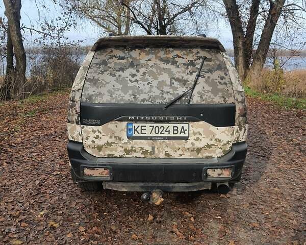 Серый Мицубиси Паджеро Спорт, объемом двигателя 2.48 л и пробегом 272 тыс. км за 9000 $, фото 3 на Automoto.ua